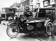 Woman riding a 1929 500cc AJS motorbike, (c1929?)