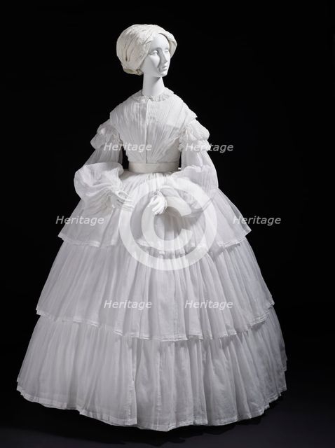 Woman's white muslin dress with tiered flounces, Europe, c.1855. Creator: Unknown.