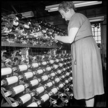 Woman worker, Wellington Mill, Strangman Street, Leek, Staffordshire, 1960-1974. Creator: Eileen Deste
