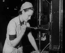 Woman Working in a Factory, 1940. Creator: British Pathe Ltd