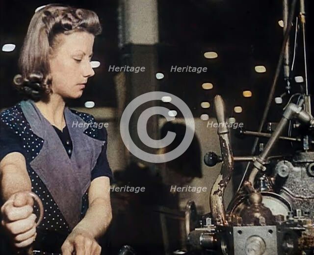 Woman Working in a Factory, 1940. Creator: British Pathe Ltd.