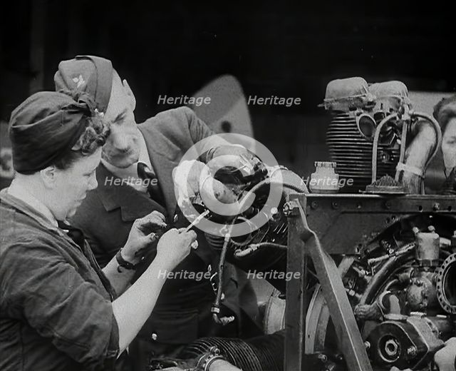 Woman Working on an Aeroplane Engine, 1942. Creator: British Pathe Ltd.