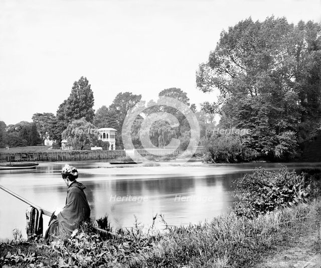 Woman waiting for the Rails Head Ferry on the River Thames, Isleworth, London, c1860-c1899. Artist: Henry Taunt.