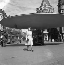Woman walking in the Stureplan square, Stockholm, Sweden, 24th July 1943. Creator: Karl Sandels