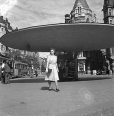Woman walking in the Stureplan square, Stockholm, Sweden, 24th July 1943. Artist: Karl Sandels