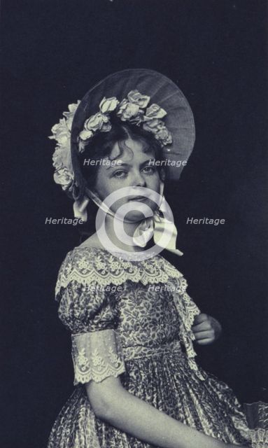 Woman wearing a bonnet, c1900. Creator: Emily G Mew.