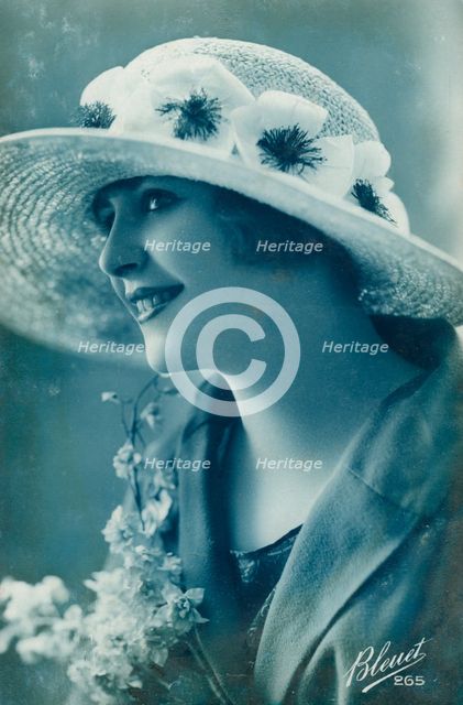 Woman wearing a hat, c1910s-c1920s(?).Artist: Bleuet