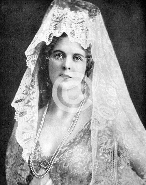 Woman wearing a lace mantilla, Andalusia, Spain, 1936. Artist: Fox