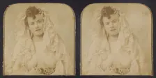 Woman wearing a lace mantilla with breasts exposed, 1855-1860. Creator: Unknown