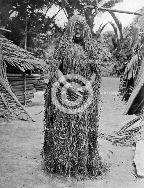 Woman wearing full mourning costume, Melanesia, 1920.Artist: Gunnar Landtman