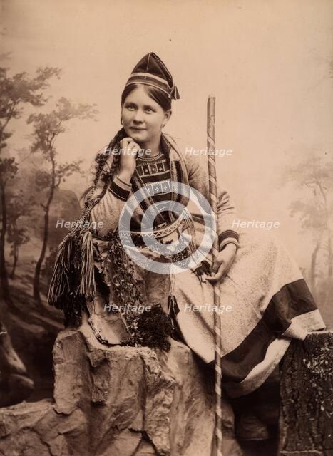 Woman wearing Sami folk costume, Inga Åren, Frostviken, Lapland, 1890-1900.  Creator: Helene Edlund.