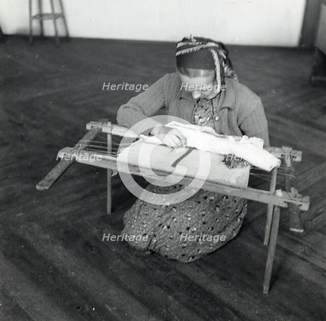 Woman weaving, Sarajevo, Bosnia-Hercegovina, Yugoslavia, 1939. Artist: Unknown