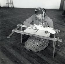 Woman weaving, Sarajevo, Bosnia-Hercegovina, Yugoslavia, 1939. Creator: Unknown