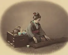 Woman with Tea Set Playing the Koto, ca. 1860. Creator: Felice Beato