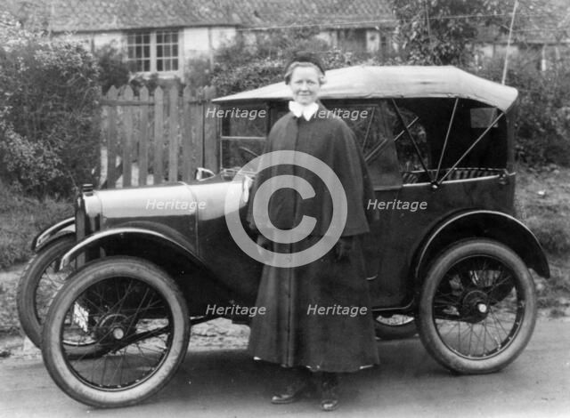 Woman with an Austin Seven, c1923. Artist: Unknown