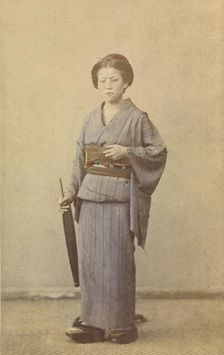Woman with closed parasol, about 1868. Creator: Felice Beato