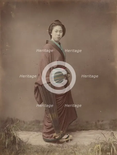 Woman with Closed Umbrella, 1870s-1890s. Creator: Kusakabe Kimbei.