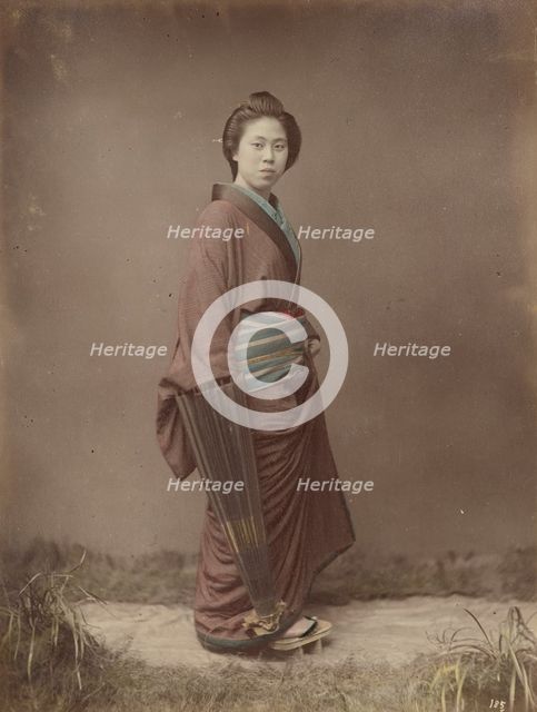 Woman with Closed Umbrella, 1870s-1890s. Creator: Kusakabe Kimbei.