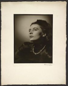 Woman with diamond necklace, 1945-1946. Creator: Gunther Krampf