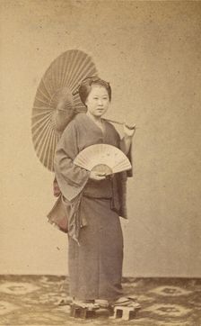 Woman with parasol and fan, about 1868. Creator: Felice Beato