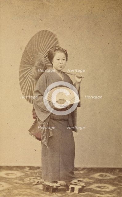 Woman with parasol and fan, about 1868. Creator: Felice Beato.