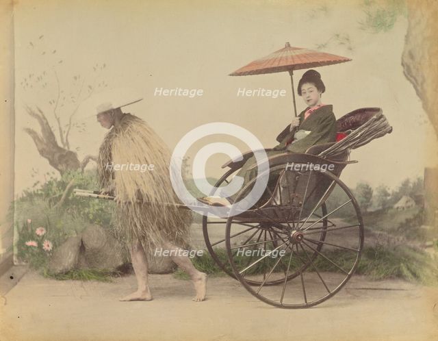 Woman with Parasol Posed Being Pulled in a Jinrikisha by a Man Wearing a Straw Rain Coat,1870s-1890s Creator: Kusakabe Kimbei.