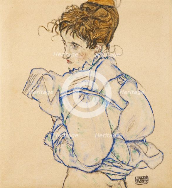 Woman taking off her blouse (probably Edith Schiele), 1917. Creator: Schiele, Egon (1890-1918).