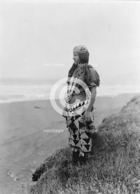 Woman's primitive dress-Tolowa, c1923. Creator: Edward Sheriff Curtis.