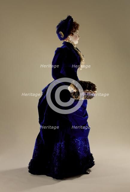 Woman's two-piece dress ensemble with matching hat, blue silk velvet., c.1880. Creator: Unknown.