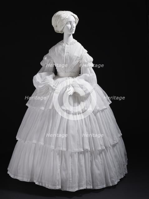 Woman's white muslin dress with tiered flounces, Europe, c.1855. Creator: Unknown.