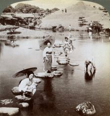 Women crossing the lake on stepping stones, Suizen-ji Garden, Kumamoto, Japan, 1904.Artist: Underwood & Underwood