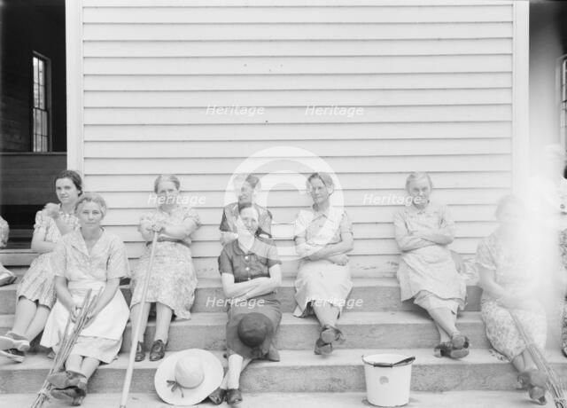 Women assembled at Wheeley's Church near Gordonton, North Carolina, to clean..., 1939. Creator: Dorothea Lange.