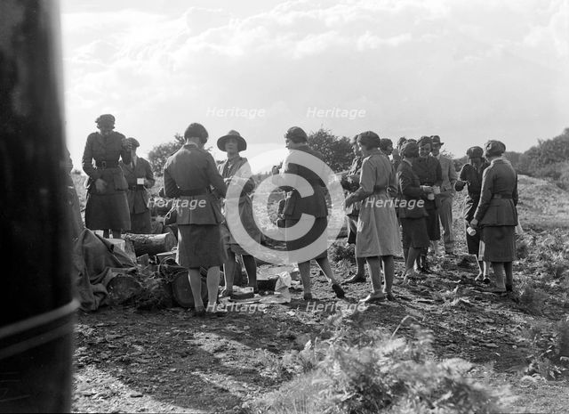 Women at a First Aid Nursing Yeomanry (FANY) trial or rally, 1931.   Artist: Bill Brunell.