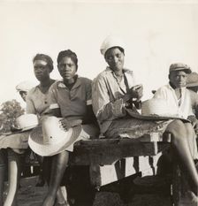 Women being transported from Memphis, Tennessee to an Arkansas plantation, July 1937. Creators: Farm Security Administration, Dorothea Lange