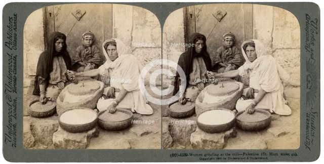 Women grinding at the mill, Palestine, 1900.Artist: Underwood & Underwood