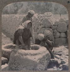 Women drawing water at the Fountain of the Magi, on the road to Bethlehem c1900