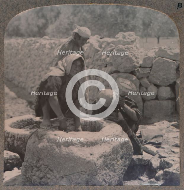 'Women drawing water at the Fountain of the Magi, on the road to Bethlehem', c1900. Artist: Unknown.