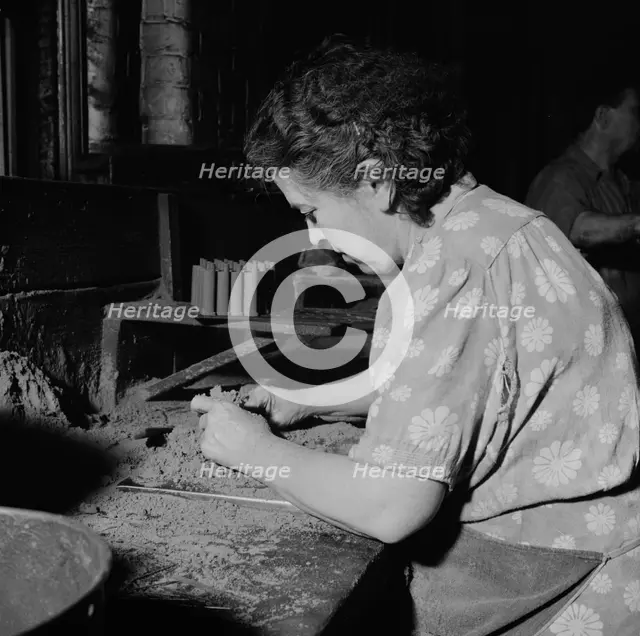 Women employed at the Landers, Frary and Clark plant, New Britain, Connecticut, 1943. Creator: Gordon Parks.