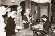 Women employees in to the library, Rowntree factory, Yorkshire, 1952