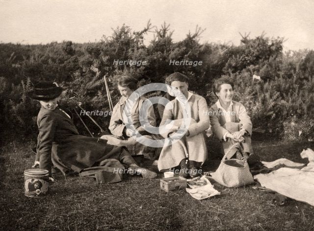 Women enjoying a picnic, 20th century. Artist: Unknown