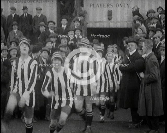 Women Football Players Walking Out Onto the Pitch, 1920. Creator: British Pathe Ltd.