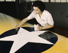 Women from all fields have joined the production army, Corpus Christi, Texas, 1942. Creator: Howard Hollem