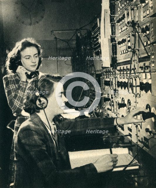 'Women have taken over men's jobs. BBC control room as a programme goes on air' 1942. Creator: Unknown.