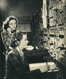 Women have taken over men's jobs. BBC control room as a programme goes on air 1942. Creator: Unknown
