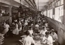 Women hand covering chocolates, Rowntree factory, York, Yorkshire, 1920