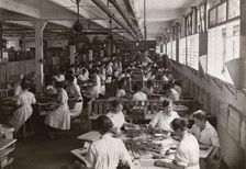 Women hand covering chocolates, Rowntree factory, York, Yorkshire, 1920