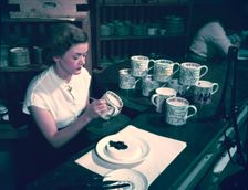 Women hand decorating souvenir mugs commemorating the Coronation of Elizabeth II, 1953. Creator: Arthur Charles Kirby Ware