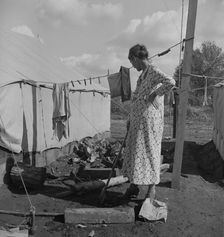 Women in auto camp for migrant citrus workers, Tulare County, California, 1938. Creator: Dorothea Lange