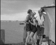Women in Bathing Costumes on a Beach, 1920. Creator: British Pathe Ltd