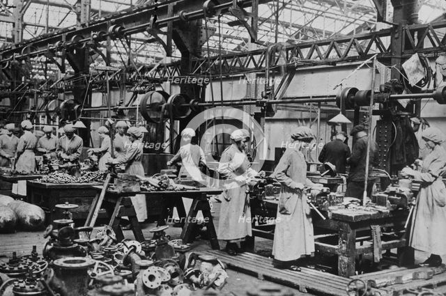 Women in brass fitting shop, Eng. [i.e. England], between c1915 and 1917. Creator: Bain News Service.